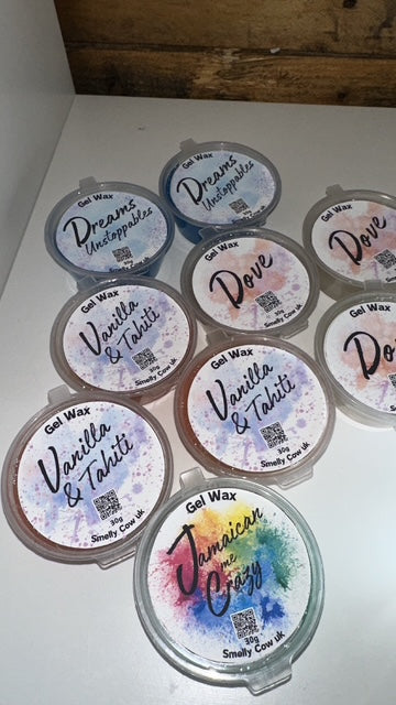 Multiple containers of Gel Wax pots with labels, on a white background.