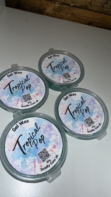 Multiple containers of Gel Wax pots with labels, on a white background.